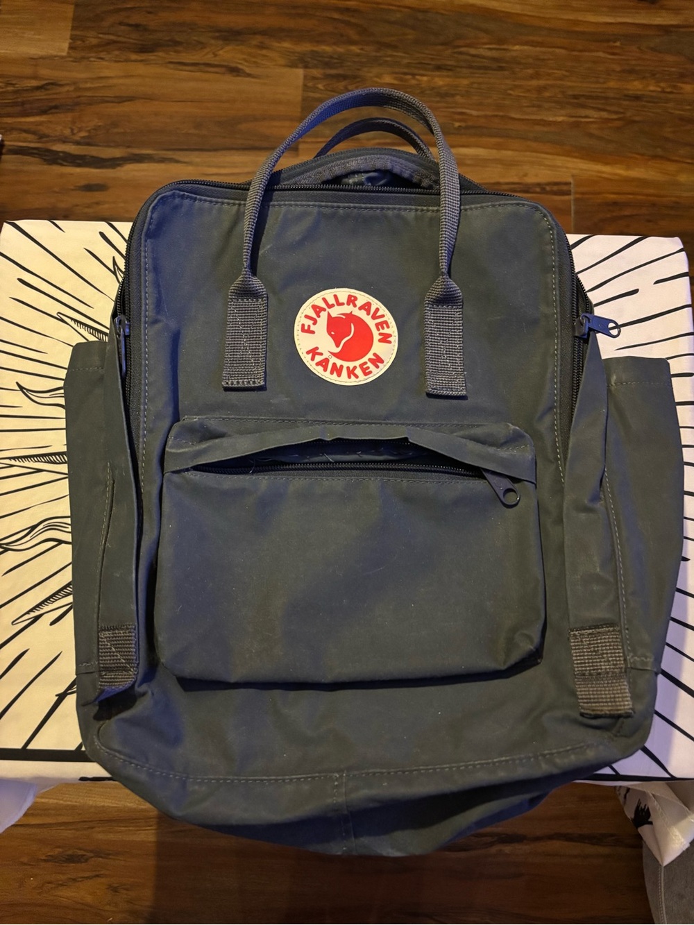 Fjallraven Kanken Backpack in Dark Green with Red Logo